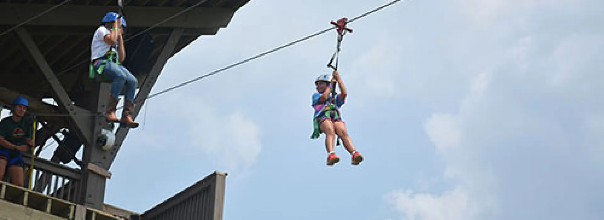 Feel the rush as you coast through the trees on our zip line.