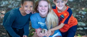 Kids holding a butterfly